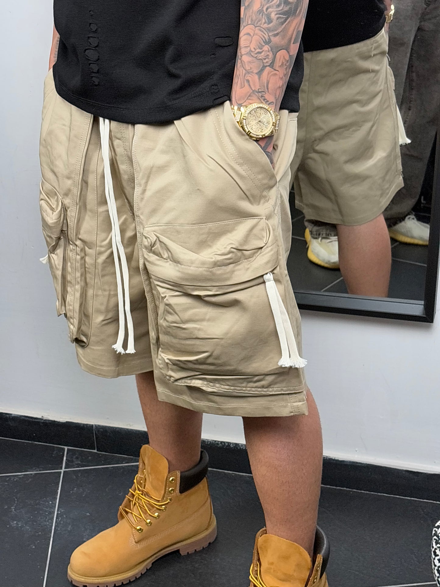 shorts over beige